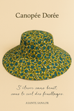 (Évoque à la fois l’ombre protectrice du chapeau et l’intensité des couleurs et des cultures qu’il incarne. Élégant, évocateur, et fort visuellement.)